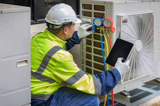 Professional Heat Pump Repair technician working in Vero Beach, FL